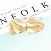 orecchini fascino Wholesale-perla per le donne d'oro increspatura dell'acqua in argento cuori in lega orecchino giovane grazia occidentale gioielli di lusso libera il trasporto