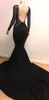 2019 Mermaid Black Prom -klänningar Långa ärmar Sexiga illusionskroppar LACE Applique Backless Formal Evening Gowns Court Train3268016