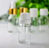 مصنع الصين 10 مل زجاجة زجاجية شفافة مع زجاجات زجاجية صغيرة للورود لزيوت E Cosmetic الأساسية