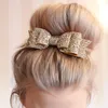 かわいいスパンの大きな弓のヘッドバンドの赤ちゃんブティック弓のヘアアクセサリー女の子のためのアリゲーターデザイナークリップ