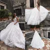 Lussano Beach Wedding Dresses Jewel Neck En linje Sweep Train Boho Bröllopsklänning Appliques Cap Sleeves Bohemian Bridal Gowns Custom Made 4519