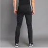 Nouveau Designer hiver Jogging pantalon hommes avec poche zippée Football pantalon formation Fitness entraînement épais course Sport pantalon Long