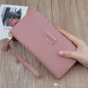 Factory whole brand handbag leather wallet Korean large capacity women fashion leathers tassel Long purse candy color hand Wal7192763