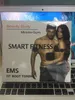 Partihandel Smart EMS Hips Trainer Electric Muscle Stimulator Wireless Buttocks Abdominal ABS Stimulator Fitness Body Massager för hem