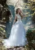 I più nuovi abiti A Line Maisonsignore gioiello collo senza maniche tulle applique in pizzo abito da sposa increspato Sweep Train robe de mari￩e