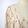 女性のためのカジュアルなドレススタイルの女性の秋と冬の長袖フリンジのスパンコールの女性のためのロングドレス