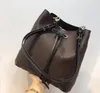 Moda hakiki deri kova çanta kadın ünlü tasarımcı İpli çanta çiçek baskı crossbody çanta Bayan Messenger Çanta