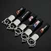 Keychain 3d auto M Linea per le prestazioni per BMW M3 M5 E36 E39 F10 F30 per Benz AMG A4 A6 A8 Q3 Q7 Ringele metallica metallica automatica della chiavetta automatica 5355324