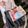 デザイナーホログラフィック透明ゼリーバッグ高品質PVC女性デザイナーハンドバッグビッグキャパシティチェーンショルダーメッセンジャーBA3411