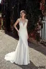 2020 nuovi abiti da sposa a sirena economici Sheer Scoop Neck Cap maniche in pizzo Appliques Button Back Sweep Train Plus Size Abiti da sposa formali