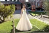 Champagne A Line Wedding Dresses Jewel Neck Illusion Cap Sleeves Illusion Lace Appliques with Button Back Long Plus Size Formal Bridal Gowns