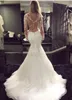 2021 Wspaniałe koronkowe sukienki ślubne syreny Sheer szyi Dubaj African Arabic Style Fishtail Bridal Suknia Plus 2378