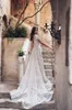 Dreamy A Line Wedding Dress V Neck Crystal Backless Lace Applique Short Sleeves Wedding Dresses Sweep Train Boho Bridal Gowns