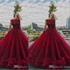 Burgundy Ball Gown Prom Dresses Illusion Lace Applique Crystal Beaded Cap Sleeves Ruffles Tulle Puffy Custom Plus Size Formal Evening Gowns