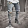 Fashion-Denim Blue Ripped Designer Jeans Mens Kläder Draped Slim Fit Holes Zipper Pencil Byxor Hombes Pantalones