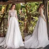 Sexy Amazing A-Line Wedding Dresses with Rhinestones Crystals Major Beading Backless Long Sleeves Ball Gown Arabric Dubai Bridal Gowns