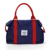 Duffel Bags Canvas Travel Bag stora kapacitet Män Handbagage duffle Nylon Weekend Women Multifunktionella1112530