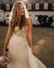 Stunning Lace Backless Beach Wedding Dresses V Neck A Line Appliqued Boho Bridal Gowns Sweep Train Chiffon robe de mariée