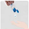 Botella de plástico vacía de 25 ml con la botella recargable mini transparente del flip gorra para el gel desinfectante desechable de la mano del líquido del maquillaje