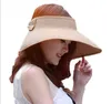 Gorące kobiety duży kapelusz z miękkim daszkiem składany słomkowy Boho kapelusz z szerokim rondem letnia plaża bowknot Lady czapki przeciwsłoneczne zawijane dc235