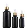 Prix de gros flacon compte-gouttes en verre vide 10 ml 15 ml 20 ml 30 ml 50 ml 100 ml flacon compte-gouttes d'huile essentielle en verre noir en stock