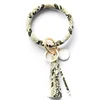 Bracciale con nappe da donna Portachiavi avvolgente in pelle PU Portachiavi con stampa di giglio leopardato Portachiavi Cerchio Catene per bracciale Moda Sole Fiore Bandiera Modello catena Cinturino rotondo