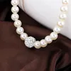 Bästsäljande Elegant Pearl Wild Fashion Designer Smycken Set Womens Pearl Halsband Armband Örhängen Brudsmycken