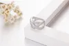 Jóias de prata esterlina 925 de luxo Mais tipo X com configuração Pave CZ Anel de diamante simulado Cocktail Anel de casamento para presente feminino