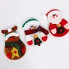 9 pezzi Set di supporti per stoviglie natalizie, pupazzo di neve Babbo Natale Elk Copri coltelli e forchette per decorazioni natalizie per la tavola di capodanno