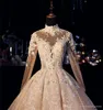 Luxury Champagne Lace Ball Gown Bröllopsklänningar Hög Neck Beaded 3D Floral Appliqued Chapel Train Bröllopsklänning Bröllopklänningar Vestidos