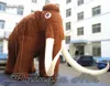 Fofo grande grande marrom inflável gigantesco performance de parada de desenho animado animal mascote a ar soprar balão de elefante de pelúcia com presas longas para o evento