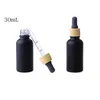 Matte Black Glass e liquid Essential Oil Perfume Bottle with Reagent Pipette Dropper and Wood Grain Cap 10/30ml