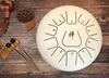 12 tum 11 anteckningar Percussion Drums Steel Tongue Drum Hand Pan Drum med trumman