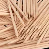 100PCs bastoni di legno Nail Spingipelle Stick bidirezionale Arancione Legno Stick Nails Pusher Polish Remover manicure La cura di