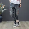 Jeans de mujer estilo de verano estilo mujer flor bordado cintura elástica suelta denim harem pantalones más tamaño vintage rasgado d555