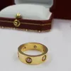 Venta al por mayor- anillos de oro rosa de acero de titanio de 6 mm y anillos de oro amante de la joyería de moda regalo de San Valentín para mujeres anillo de pareja