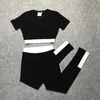 Novo verão moda europeia feminina cintura alta manga curta camiseta curta com estampa de letras e leggings esportivas yoga longo conjunto twinset