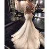 2018 Sexiga Långärmade Bröllopsklänningar Mermaid Illusion Sheer Back Bridal Gowns Vintage Trumpet Style Custom Gjorda
