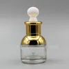30ml / 1ozアップスケール詰め替え可能な透明なガラスの滴のびんのエッセンシャルオイル化粧品瓶の鍋コンテナびんぷのピペットの滴