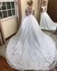 2020 Nyaste Långärmade Ballgown Bröllopsklänningar Sheer Scoop Neck Lace Applique Sexig Illusion Back Chapel Tåg Anpassad Bröllopsklänning
