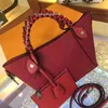 Latest Women's Handbag brand fashion luxury hollow-carved designer crossbody bag High quality Portable +shoulder woman bag size 23x21x13cm