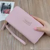 Factory whole brand handbag leather wallet Korean large capacity women fashion leathers tassel Long purse candy color hand Wal7192763