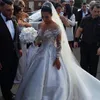 2020 New Sexy Ball Gown Wedding Dresses Sheer Neck Long Sleeves Illusion Crystal Beaded Satin Sexy Back Chapel Train Plus Size Bridal Gowns