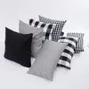 grey sofa with cushions
