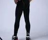 Ücretsiz Kargo erkek sıkıştırma pantolon spor koşu tayt basketbol spor salonu pantolon vücut geliştirme joggers skinny tozluk ile logoları