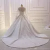 Taglie forti Nuovo abito da ballo Abiti da sposa Abiti da sposa Applique in pizzo Perline Paillettes Manica lunga Bottoni Indietro Sweep Train Dubai Arabic Custom