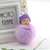 Fluffig sovande baby nyckelring 8 cm plysch boll söt docka guld metall mjuk boll pom nyckelkedjor ring för bilväska mode butik acces3118833