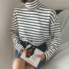 春と秋の長袖のタートルネックの縞模様のカジュアルTシャツ緩いプルオーバーリージュートップス女性の布