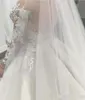 Perlenkleider lange Ärmel Spitzenapplikationen Kristalle Überschreiten reine Nackenkapelle Zug Hochzeit Brautkleid Vestido de Novia