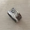 Högkvalitativ Punk Luxury Silver 316 Titanium Stål 18K Vit Guldpläterad Blomkristall ihålig bred 10mm Kärlek Bröllopsband Ring Män Kvinnor